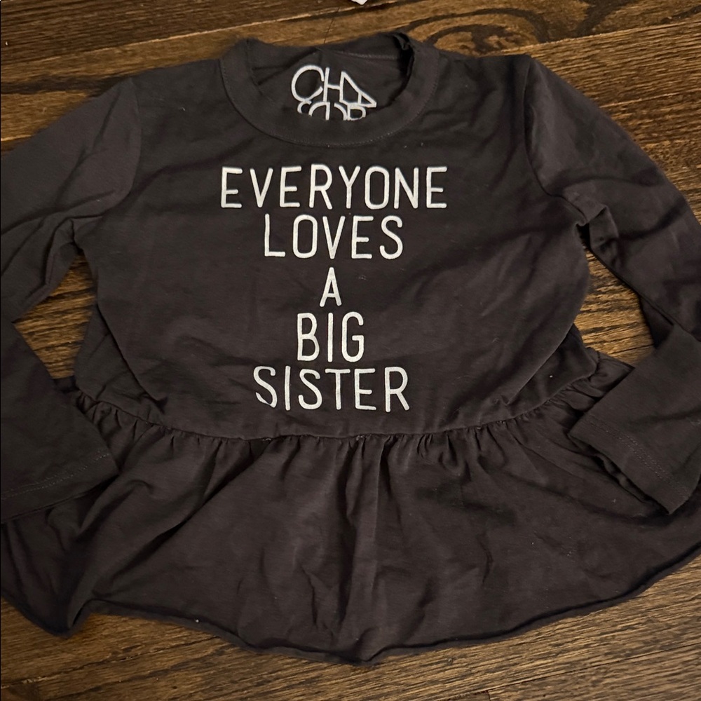 Chaser Black Long-Sleeve Peplum Top with "Everyone Loves A Big Sister"